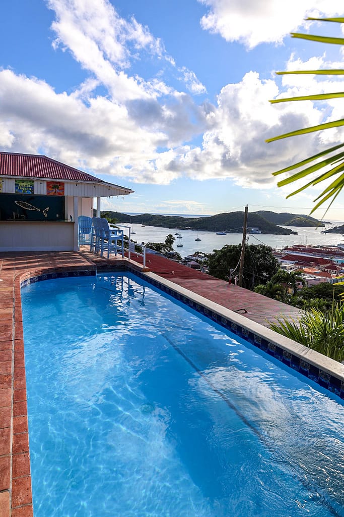 St. Thomas beach wedding setting with Charlotte Amalie Harbor and sailboats in the background